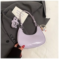 Detail view of light purple underarm bag with decorative pearl chain and cute charm - Purple With Pendant
