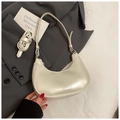 Close-up of pearl white hobo bag showing texture, long strap and fashion lettering - White Without Pendant
