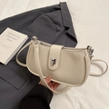 Chic cream-colored hobo bag with silver buckle and smooth PU leather strap - Milky Apricot