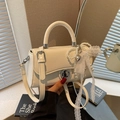 Creamy white crossbody bag with pearl bow and lace detail in a minimalist studio setting - White (With Pendant)
