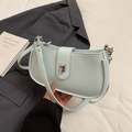 Mint green PU leather underarm bag with lychee texture and decorative buckle detail - Creamy Blue