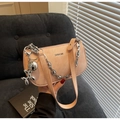 Detail of pink faux leather underarm bag with silver chain and cute dog charm - With Pendant / Pink