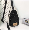 Detail of outdoor crossbody bag with elastic sports cords and brand logo patch - White Black