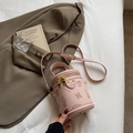 Pink cylinder bucket bag with teddy bear embossing and golden bear-shaped zipper pulls - Pink Without Pendant