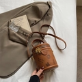 Caramel brown cylinder bucket bag in pebbled leather with cute bear motif and charm - Brown No Pendant