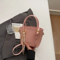 Pink contrast color bucket bag with tassel charm and adjustable strap for women - Pink with Pendant