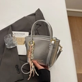 Silver PU leather bucket bag with gold hardware and pink braided charm on grey blazer - Silver (With Pendant)