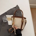 Fashion contrast color bucket bag in cream white and brown with woven strap detail - Beige With Charm