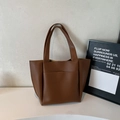 Minimalist caramel brown leather tote bag with dual handles and spacious open design - Dark Brown