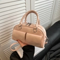 Pink PU leather bowling handbag with double front pockets and adjustable strap - Pink Without Pendant