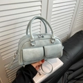 Ice blue bowling handbag in matte leather with dual pockets and silver hardware detail - Blue Without Charm