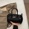 Classic black litchi grain leather handbag with top handle and silver buckle - Black