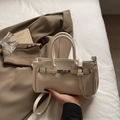 Elegant cream white lychee pattern leather handbag with silver metallic turn-lock closure - Beige