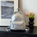 Sac à dos argenté avec motifs floraux et finition métallique laser sur meuble noir - Grand Argent Sans Pendentif