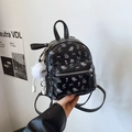 Mini sac à dos noir avec motifs floraux violets et breloque peluche monstre - Noir Petit Avec Pendentif