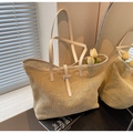 Close-up of beige woven tote bag with white leather straps and interior leather clasp - Off-white