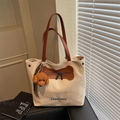Borsa tote in tela bianco sporco con manici in pelle marrone e ciondolo a cane - Grigio Riso Con Pendente