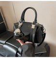 Detail of glossy black patent leather mini bowling bag with silver heart charm and strap - With Heart Charm / Black