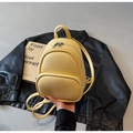 Mini yellow textured leather backpack for women with silver zippers and fashion lettering - Yellow