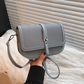 Gray-blue vintage crossbody bag with woven texture flap and metallic closure - Blue