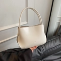 Minimalistische cremeweiße Leder-Eimertasche mit Tragegriff und Clear'K-Logo - Ohne Anhänger / Weiß