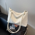 Borsa tote bianco panna con motivo in rilievo e sottili spalline con nodi - Bianco Sporco