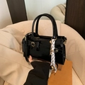 Black patent leather handbag with bow detail and striped scarf, casual crossbody style - Black with Pendant