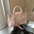 Pink textured fabric tote bag with leather trim and gold button for women's daily use - Pink