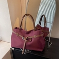 Burgundy nylon tote bag with brown leather handles and a silver buckle accent - Burgundy