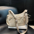 Sac bandoulière en nylon beige de forme demi-lune avec des nœuds décoratifs - Kaki