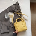 Yellow faux leather bucket bag with top handle and adjustable shoulder strap - Yellow Without Pendant