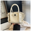 Chic beige lychee grain bucket bag with sleek metal hardware for daily commute - White