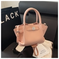 Chic pink bucket bag in pebbled faux leather with adjustable crossbody strap - Pink