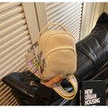 Beige nylon crossbody mini bag with multi-zipper pockets and colorful jacquard strap - Khaki