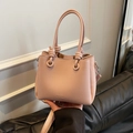 Pink lychee texture bucket bag with elegant knot handle and CLEA-BOX branding - Pink Without Pendant