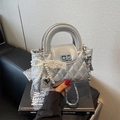 Silver quilted chain bag with round handle, pearl bow and heart charm accent - With Charm / Silver