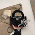 Quilted black patent leather handbag with chain strap, bow charm and pearl detail - With Charm / Black