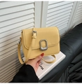 Chic yellow minimalist square crossbody bag with textured leather and silver clasp - Yellow