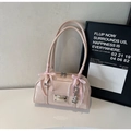 Detail of light pink patent leather handbag with satin bow and heart pendant - Pink with Pendant