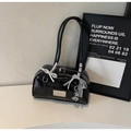 Detail of black glossy shoulder bag with silk bows and heart charm decoration - Black with Pendant