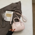 Pink synthetic leather crossbody pillow bag with heart stitching and adjustable strap - No Pendant / Pink