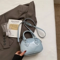 Light blue mini boston bag with heart-shaped handle detail and crossbody strap - No Pendant / Blue