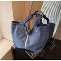 Minimalist navy blue canvas tote bag with white stripes and elegant golden rivets - Blue