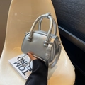Chic silver metallic mini Boston handbag with curved dual handles and adjustable strap - Silver