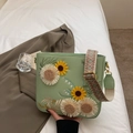 Light green leather bucket bag with floral embroidery and wide jacquard strap - Green