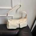 Creamy white underarm bag in glossy patent leather with dual front pocket details - Rice White (No Pendant)