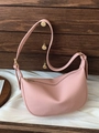 Pink lychee grain leather crescent saddle bag with adjustable strap and gold hardware - Pink
