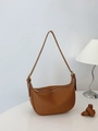 Brown lychee leather crescent saddle bag with adjustable strap and zipper closure - Brown