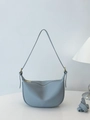 Chic foggy blue half-moon saddle bag in pebbled leather with adjustable shoulder straps - Blue