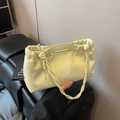 Minimalistische Kordelzug-Handtasche in Hellgelb aus PU-Leder mit weichem Wolken-Design - Gelb